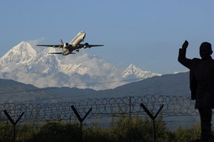 Nepal, kathmandu, Plane taking off with Himalayas behind